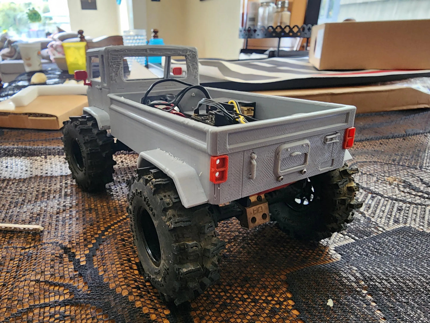 1/24 scale forward cab body with red taillights on SCX24 chassis
