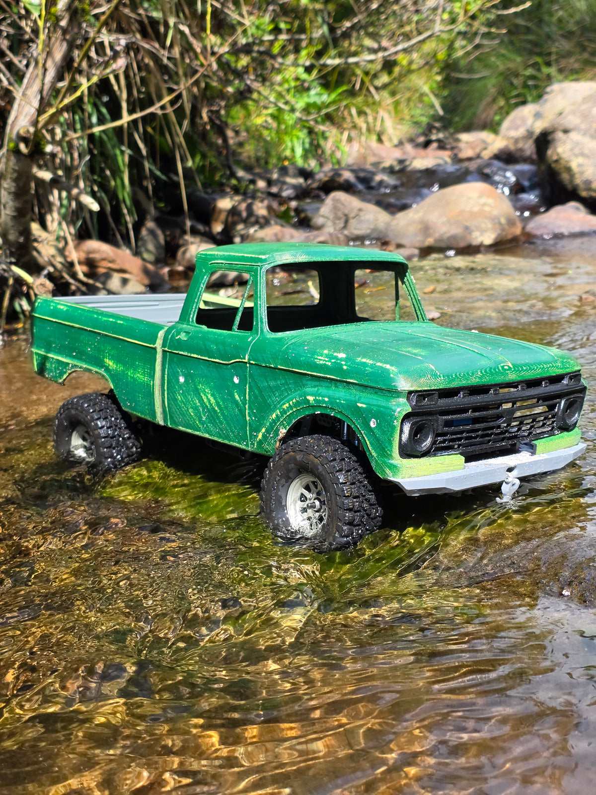 1963-66 Ford F100 painted RC body and mounts on BBV5 chassis, crossing a creek