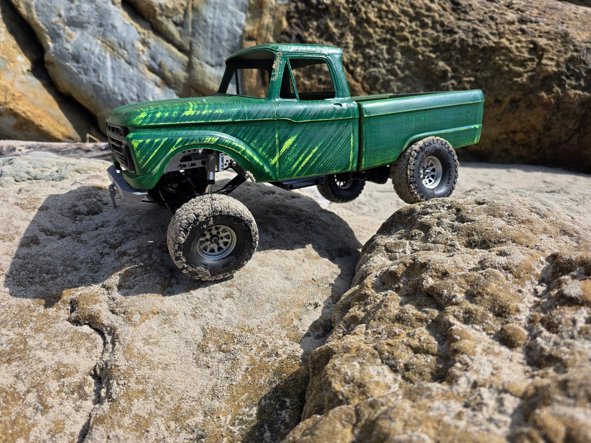 1963-66 Ford F100 painted RC body and mounts on BBV5 chassis, rock crawling on coastal rocks