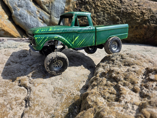 1963-66 Ford F100 painted RC body and mounts on BBV5 chassis, rock crawling on coastal rocks