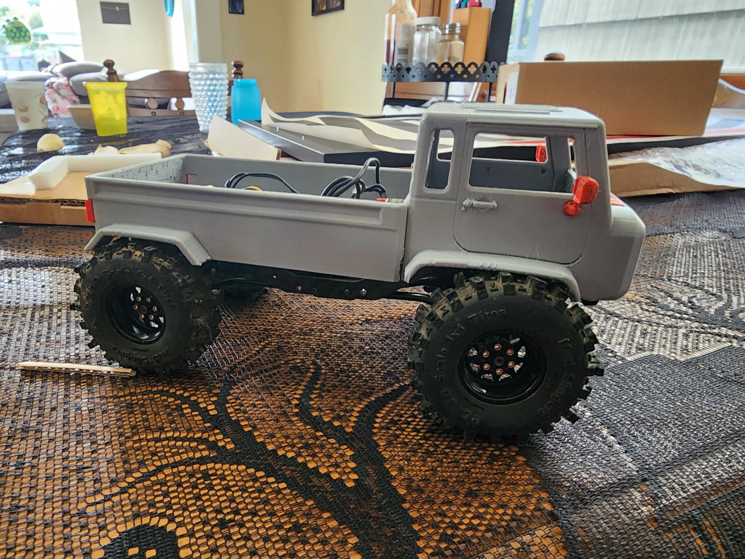 SCX24 forward cab body mounted on 1/24 scale RC crawler, grey PETG